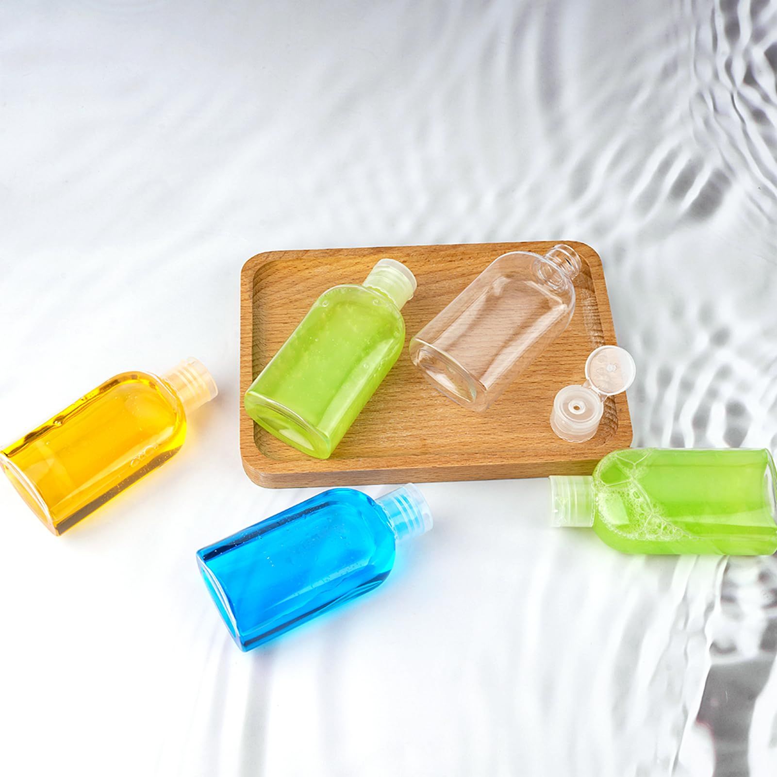 Travel Size Containers Plastic Travel Bottles Leak Proof Squeeze Bottles with Flip Cap Travel Bottles for Toiletries (4 Pack)
